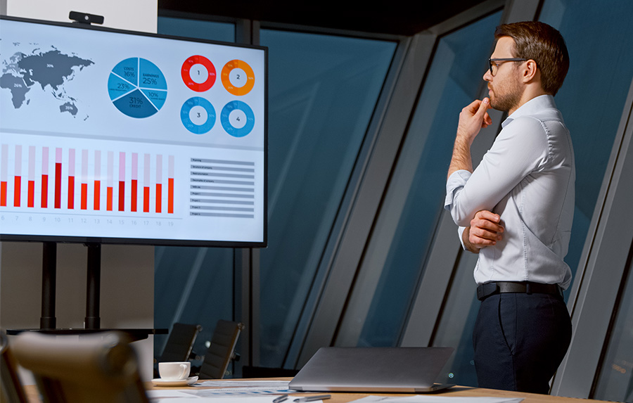 business-executive-looking-at-analytic business-executive-looking-at-analytic